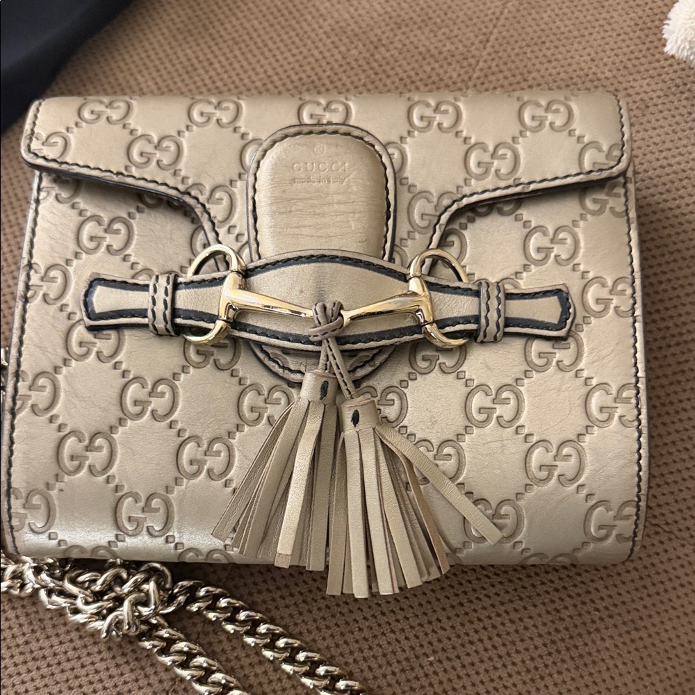 Gucci Beige Crossbody Bag with Tassel and Gold Accents